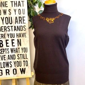 BCBGMAXAZRIA sleeveless turtleneck.